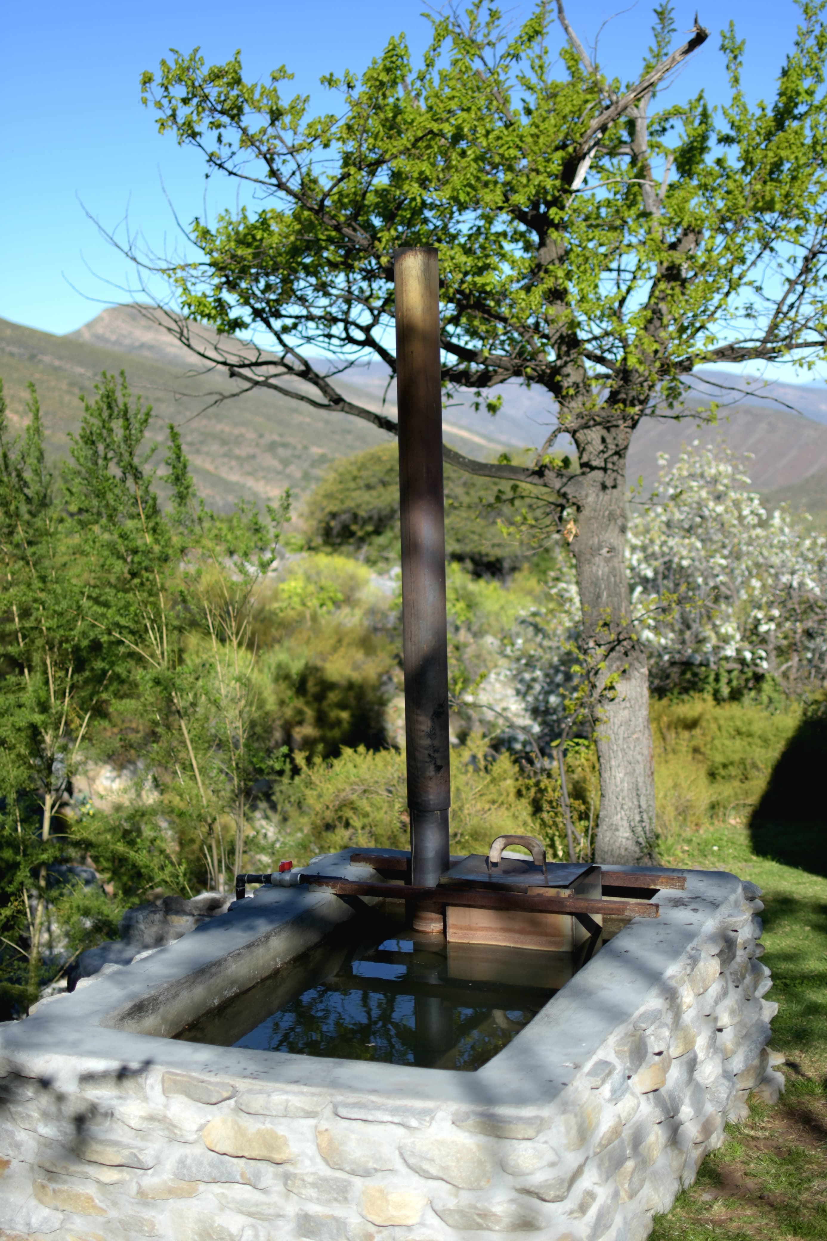 Oakron hot tub Patatsfontein Stay Oakron luxury glamping tent at Patatsfontein Stay with private hot tub and green lawn in the Patatsfontein Valley near Montagu, Western Cape Karoo