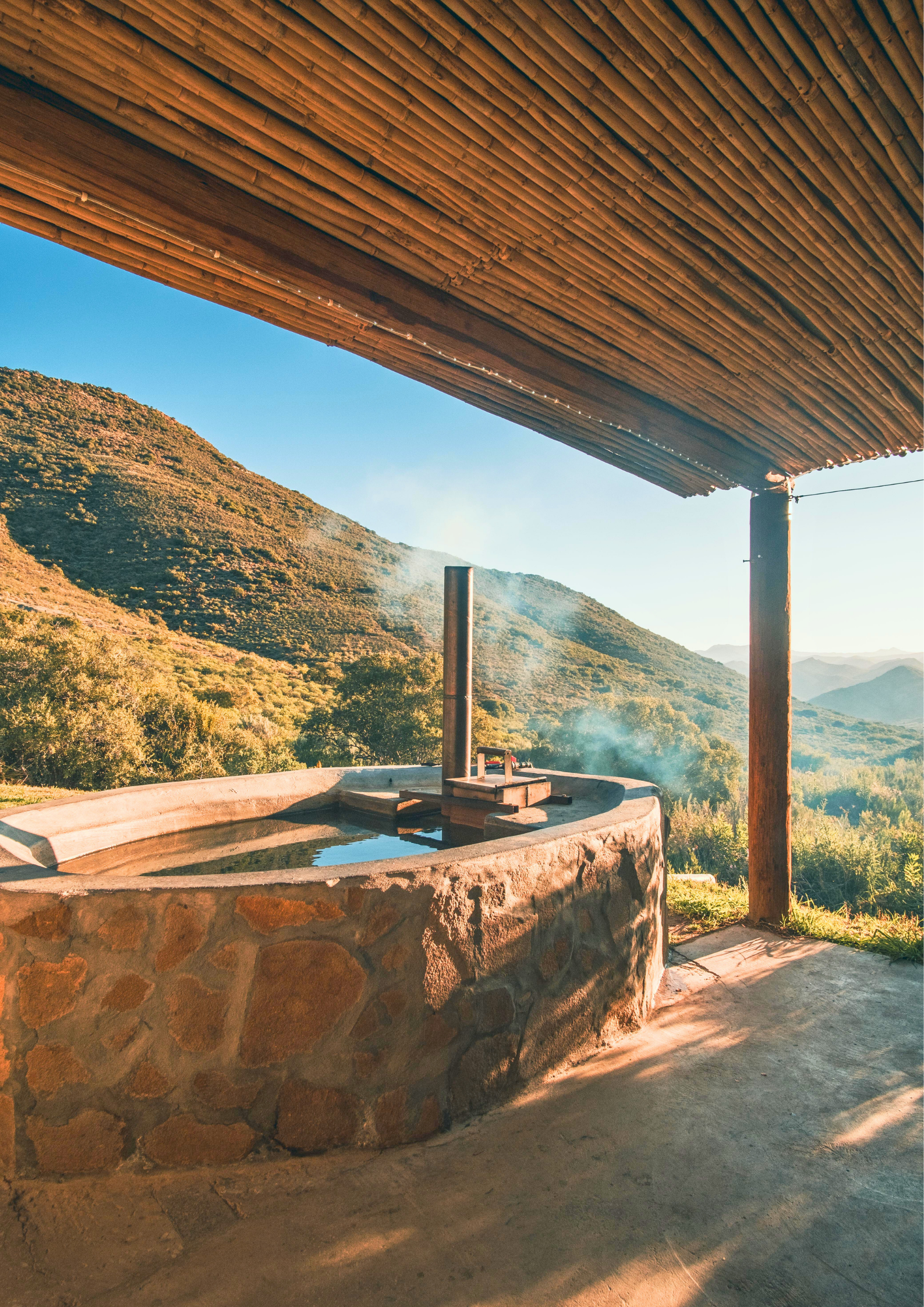Aloeron off-grid glamping tent at Patatsfontein Stay set among red aloes with sunset views over the Karoo near Montagu, Western Cape